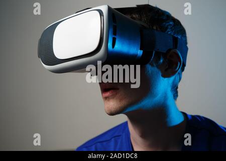 Man wearing virtual reality goggles. Stock Photo