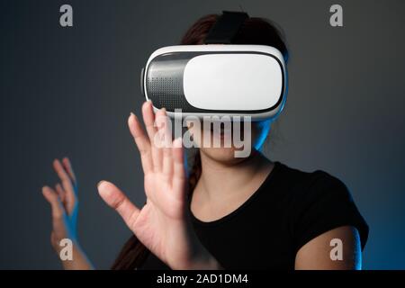 Woman using the virtual reality headset Stock Photo