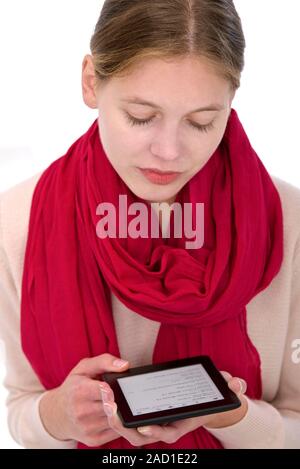 Woman using e-reader. Stock Photo