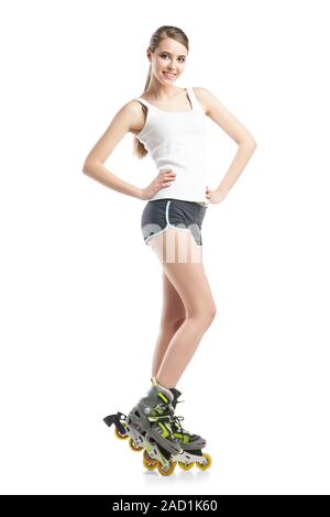 young pretty woman on roller skates Stock Photo