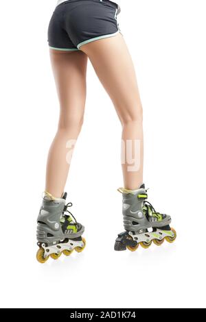 Close up  picture of woman's legs with rollerskates Stock Photo