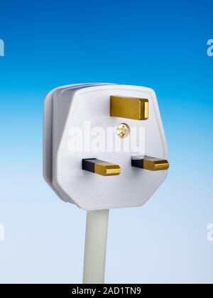 Three-pin plug. View of a three-pin mains electrical plug as used in the UK. This is typically used for appliances. Stock Photo
