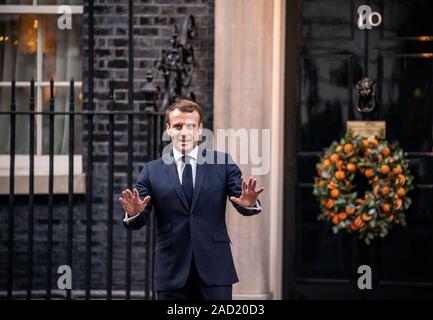 London, UK. 03rd Dec, 2019. Emanuel Macron, President of France, arrives at a meeting of the four heads of government of Germany, France, England and Turkey at Downingstrasse 10 before the start of the actual NATO summit. The subject of the meeting will be the conflict in Syria. The meeting of heads of state and government will celebrate the 70th anniversary of the military alliance. Credit: Michael Kappeler/dpa/Alamy Live News Stock Photo