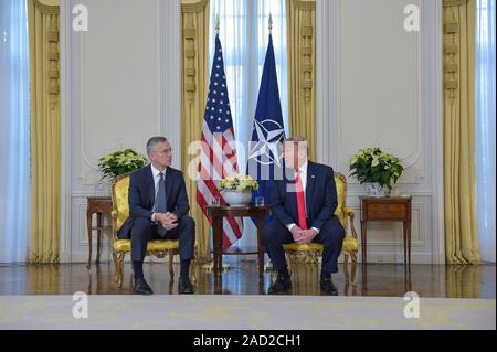 London, UK. 03rd Dec, 2019. NATO General Secretary Jens Stoltenberg(L) meets with U.S. President Donald Trump in London, Britain, on Dec. 3, 2019.  -EDITORIAL USE ONLY-(No material produced by NATO is to be sold, used for outside advertising or promotional purposes of any kind. Photos, videos and articles are released under the legally recognized terms of 'Fair Use' to members of the press, academia, non-profits and the general public. No material is to be used in programs, articles or online publications of any kind that defame NATO or its member countries. Credit: Xinhua/Alamy Live News Stock Photo