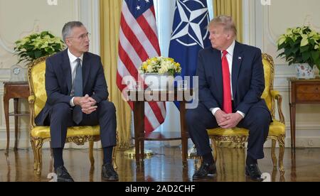 London, UK. 03rd Dec, 2019. NATO General Secretary Jens Stoltenberg(L) meets with U.S. President Donald Trump in London, Britain, on Dec. 3, 2019. -EDITORIAL USE ONLY-(No material produced by NATO is to be sold, used for outside advertising or promotional purposes of any kind. Photos, videos and articles are released under the legally recognized terms of 'Fair Use' to members of the press, academia, non-profits and the general public. No material is to be used in programs, articles or online publications of any kind that defame NATO or its member countries. Credit: Xinhua/Alamy Live News Stock Photo