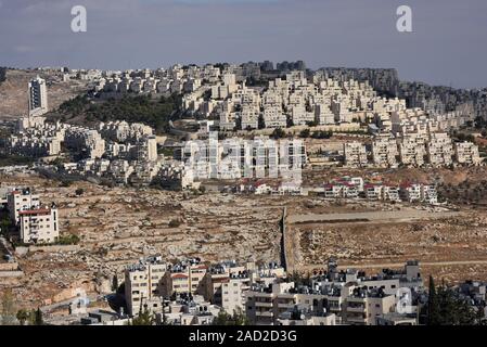 Bethlehem, West Bank. 03rd Dec, 2019. The Israeli settlement of Har Homa is seen on the hilltop overlooking the Palestinian town of Bethlehem, West Bank, December 3, 2019. Palestinian officials say the biblical city of Bethlehem is being suffocated by the expansion of Israeli settlements that is taking Palestinian lands to build Jewish homes in the West Bank. Photo by Debbie Hill/UPI Credit: UPI/Alamy Live News Stock Photo