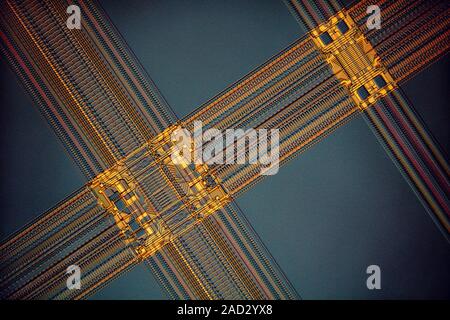 Computer RAM module. Light micrograph of a 1 megabyte fast page mode dynamic random-access memory (FPM DRAM) module. Random-access technology allows t Stock Photo