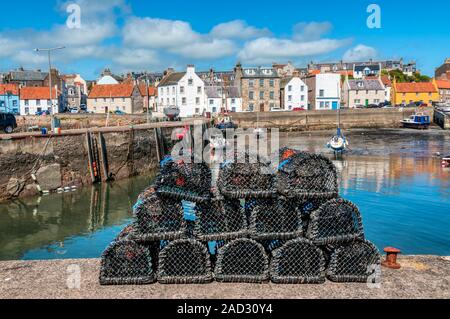 Seafront of the picturesque seaside village of St Monans in the East Neuk of Fife, Scotland, seen across the habour. Stock Photo