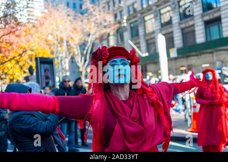 Environmental activists affiliated with Extinction Rebellion protest in Herald Square in New York on Friday, November 29, 2019. (© Richard B. Levine) Stock Photo