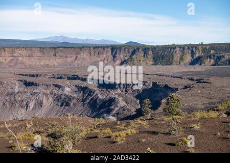 looking across the Kilauea Caldera with blue skies Big Island, Hawaii, USA Stock Photo