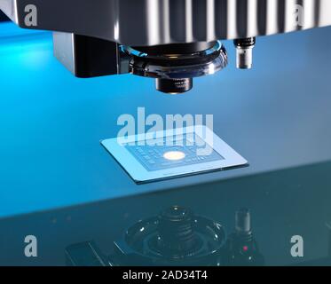 Co-ordinate measuring machine testing. Close-up of the probe head of a coordinate measurement machine (CMM), a system capable of accurate 3D measureme Stock Photo