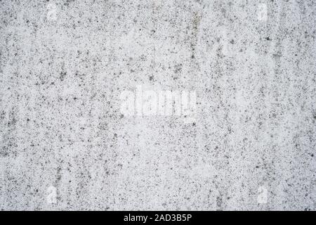 weathered wall grunge background, white plaster with black distressed texture Stock Photo