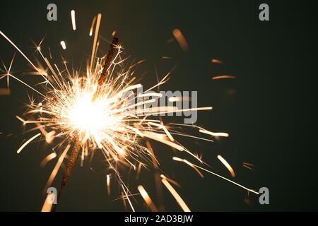 Christmas sparkler on black background Stock Photo