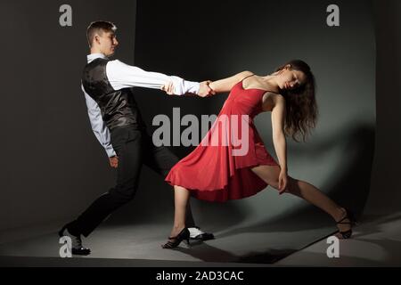 Dancing couple holding hands Stock Photo