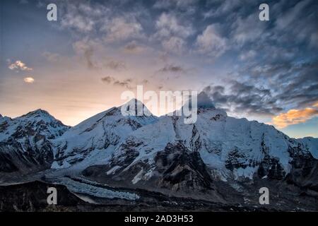 The summits of Mt. Everest and Mt. Nuptse above Khumbu glacier at sunrise, seen from the top of Kala Patthar Stock Photo