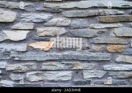 pattern of decorative slate stone wall surface Stock Photo