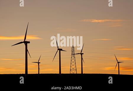 Dunlaw wind farm, Soutra Hill, Scotland, UK. 3rd December 2019. Cool afternoon but mild compared to the past weekend just before sunset the sky showing pastel colours behind and around the huge turbines. Stock Photo