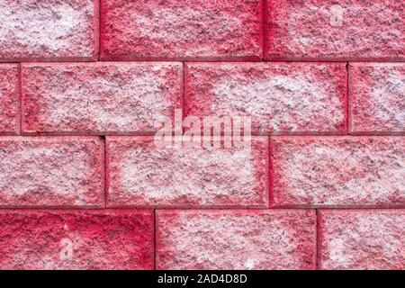 Coral, pink, red brick wall textured background. Ideal backdrop for your design. Stock Photo