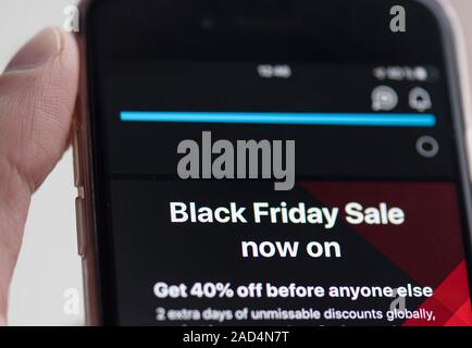 Black Friday Text on Screen of Device, Mobile Phone Stock Photo
