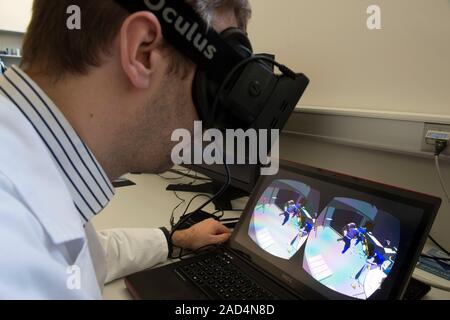Forensics virtual reality headset. Experimental use of an Oculus Rift virtual reality headset in a crime scene reconstruction. In the future this appr Stock Photo