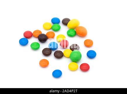 Colorful Candies isolated on white Background, chocolate coated Candies Stock Photo