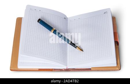 Fountain pen on top of the open notebook Stock Photo