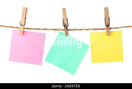 Multicolored paper stickers on clothespins Stock Photo