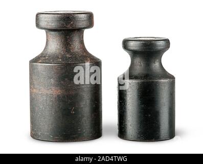 Two old rusty scale weights Stock Photo