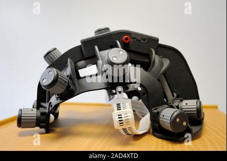 Robik prototype brain-computer interface (BCI). This helmet consists of electrodes which detect electrical signals produced by brain activity. It allo Stock Photo