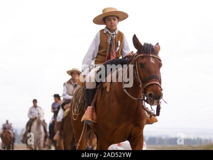 The Cabalgata Los Compadres of Vista Flores and Tunuyan is a parade of horsemen and their families that takes place in late November. Stock Photo