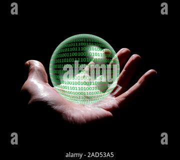 Digital predictions. Conceptual image of binary code (ones and zeroes) in a crystal ball, representing digital data being used in forecasts and predic Stock Photo