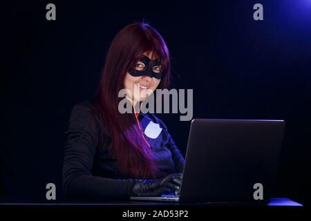 Girl in mask at night Stock Photo