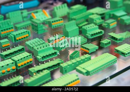 Terminals, contactors, relays, switches on the stand. Electrical components Stock Photo