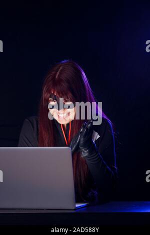 Night photo of hacker girl Stock Photo