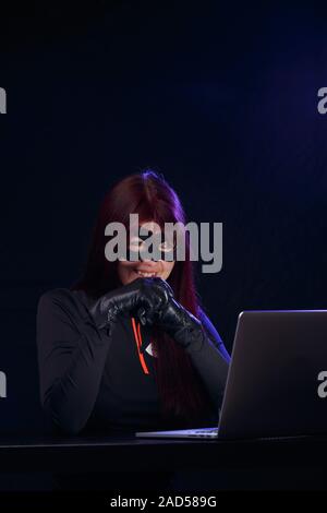 Night thief in black mask Stock Photo