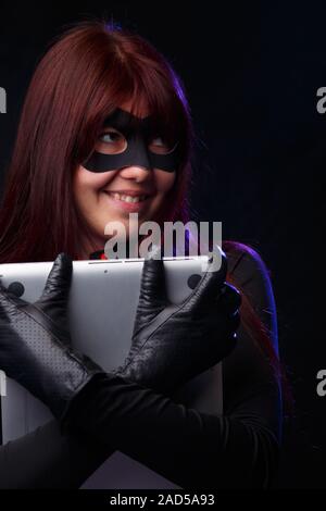 Happy thief in black gloves Stock Photo