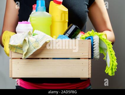 Woman in gloves with box Stock Photo
