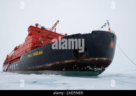 Russia, High Arctic, Geographic North Pole. 90 degrees north with 50 Years of Victory Russian icebreaker. Stock Photo