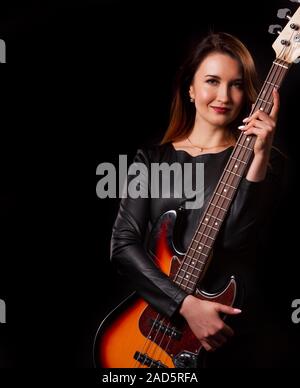 Portrait of woman with guitar Stock Photo