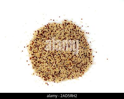 Raw quinoa seeds isolated on white background, top view, close-up Stock Photo