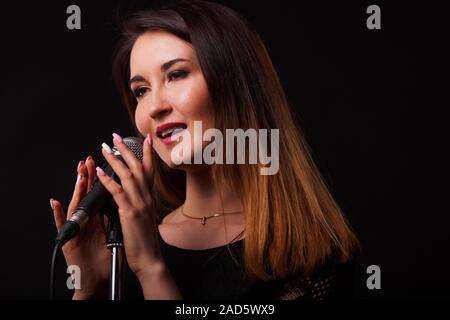 Singer on background of smoke Stock Photo