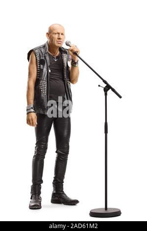 Bald punk rocker singing on a microphone and playing a guitar isolated ...