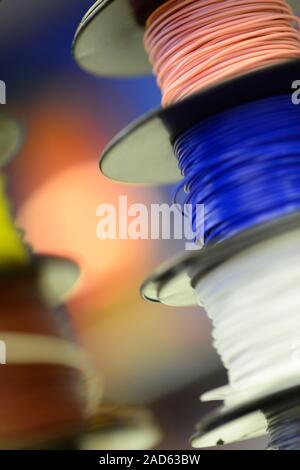 Reels of insulated electrical wire. Stock Photo