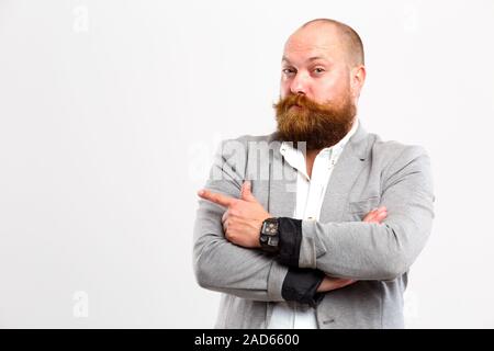 Human points finger to side Stock Photo