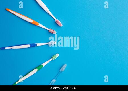 Colorful toothbrushes place for inscription Stock Photo