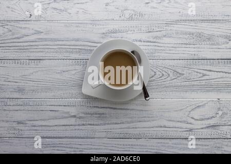 Coffee Cup in front of a coloured background with copy space Stock Photo