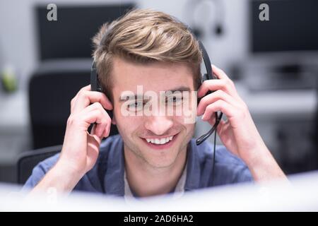 male call centre operator doing his job Stock Photo