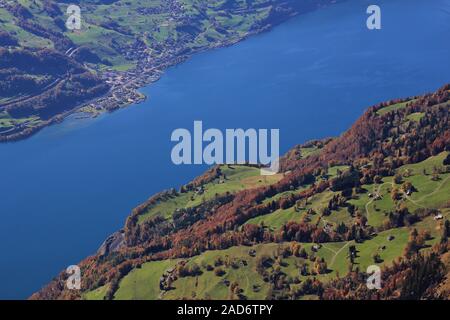 Lake Walensee and colorful forest. Walenstadtberg. View from Chaeserrugg. Autumn scene in Switzerland. Stock Photo