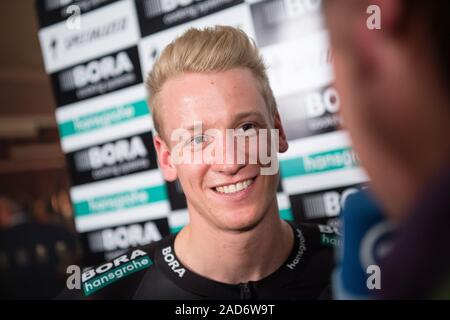 Kolbermoor, Germany. 03rd Dec, 2019. Pascal Ackermann, member of the German racing team Bora-hansgrohe, answers journalists' questions in an interview during the presentation of the cycling team for the year 2020. Credit: Matthias Balk/dpa/Alamy Live News Stock Photo