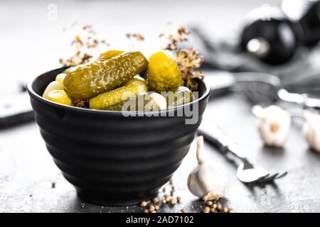 Pickled cucumbers, small marinated pickles, gherkins Stock Photo